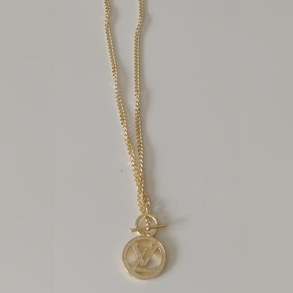 Louis Vuitton Gold and Crystal Pendant Necklace - Picture 7 of 12